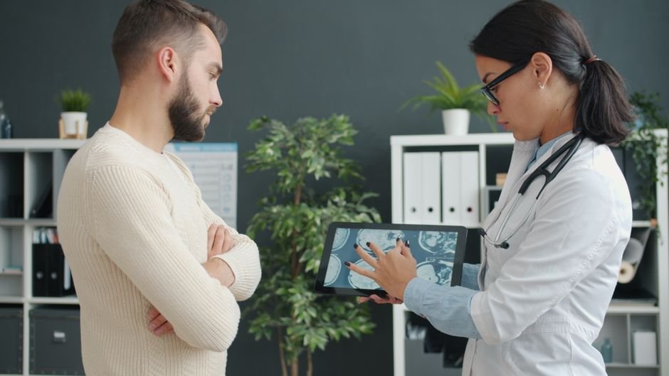 pexels photo 39192386.jpg Healthcare professional explaining detailed sleep study results to a patient in an office