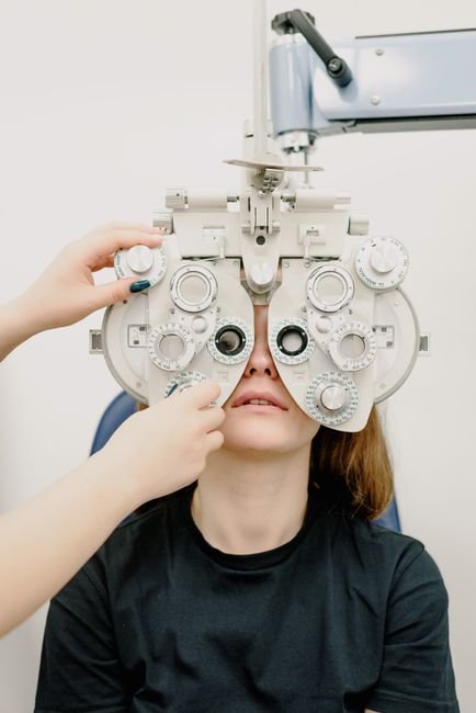pexels photo 5752284.jpg An ophthalmologist performing an eye exam, symbolizing the importance of correct medical coding.