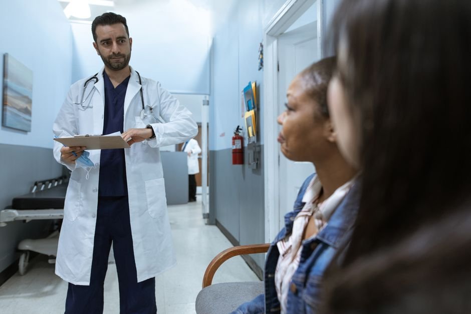 Healthcare professionals collaborating on a medical billing workflow for efficient urology claims processing