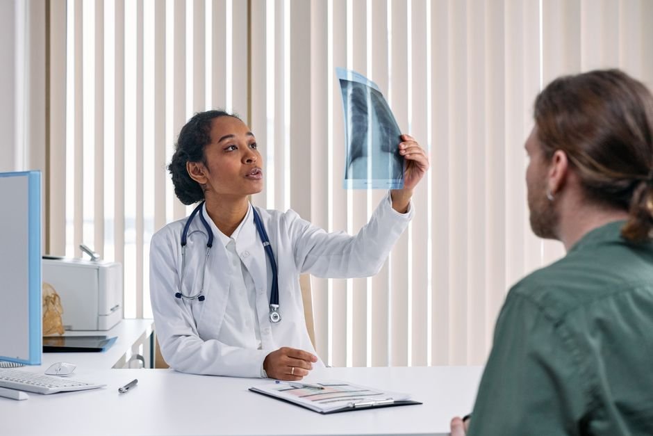 Healthcare provider discusses lab results with patient, explaining laboratory billing implications.