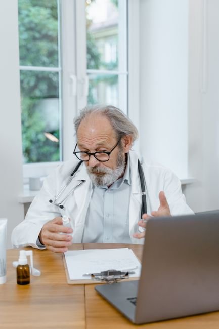 Medical professional explaining complex CPT codes and billing regulations to a colleague.