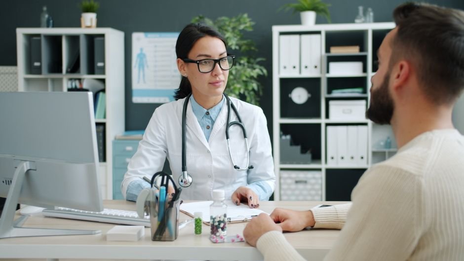 pexels photo 39192383.jpg Healthcare professional discussing self-pay collections and payment options with a patient