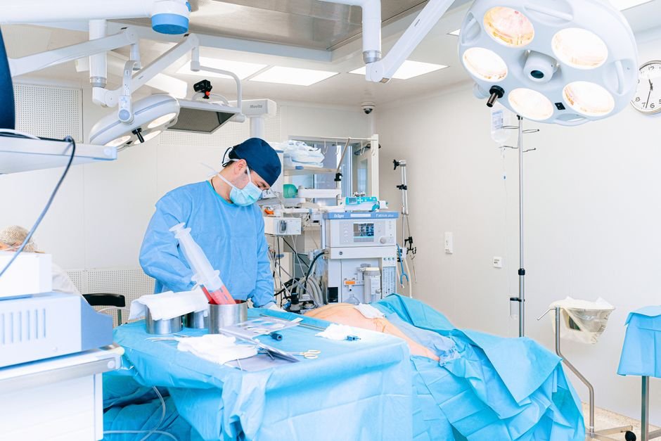 pexels photo 4769133.jpg Surgeon team performing a critical operation, ensuring patient safety and compliance for global surgery period.