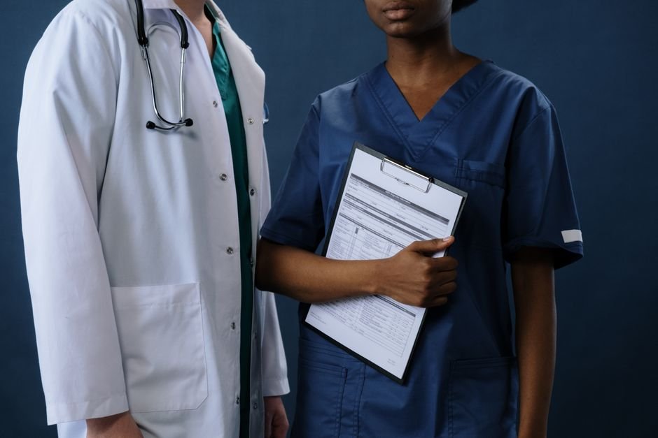 pexels photo 5722160.jpg Healthcare professionals reviewing clinical documentation integrity metrics to enhance diagnostic coding accuracy.