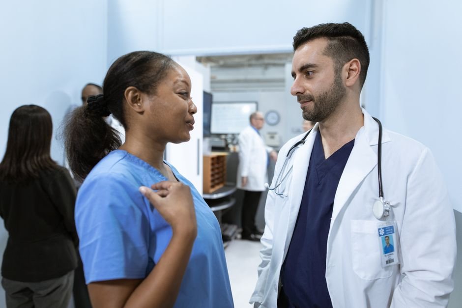 A healthcare team collaborates on coordinating a patient's transition of care.