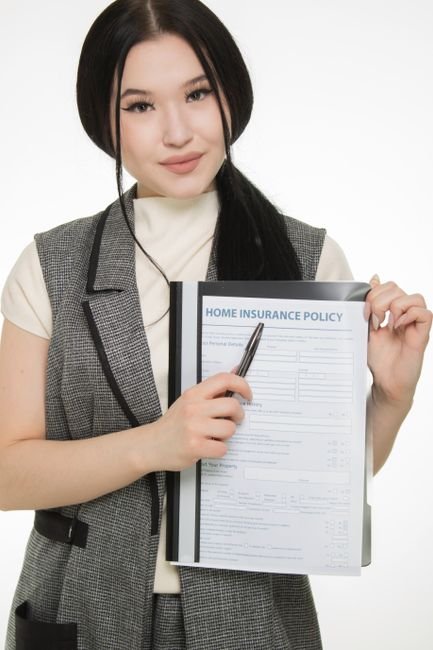Patient reviewing healthcare claims processing with dual insurance policy documents